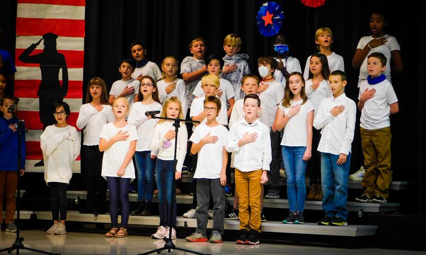 Students sing in Veterans Day performance